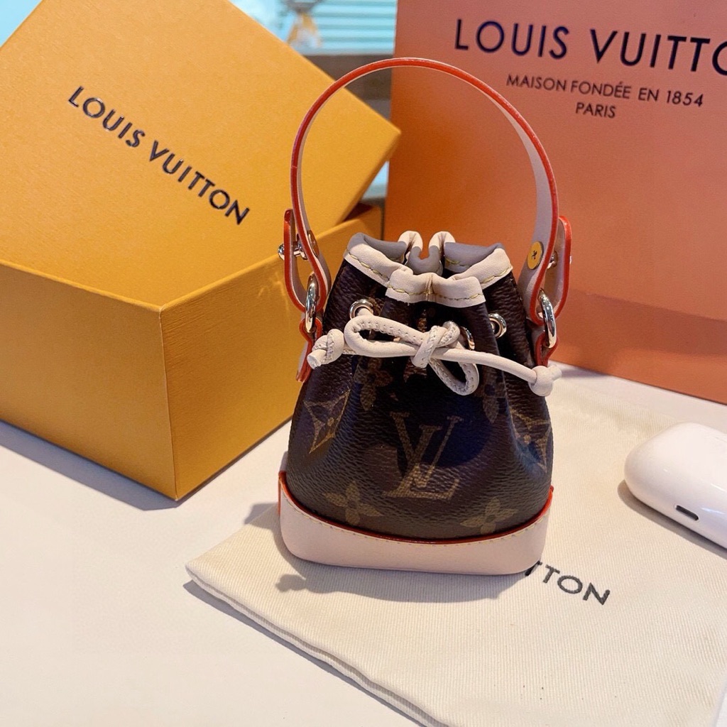Louis Vuitton Mini Drawstring Bucket Bag In Brown, White And Orange Trim